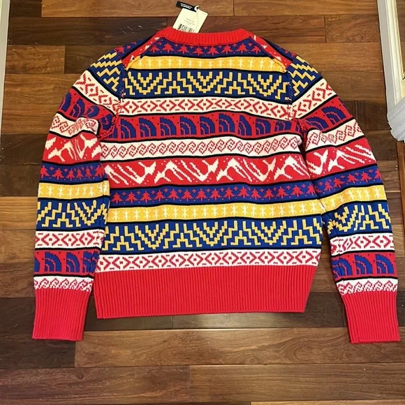The NorthFace Crew Sweater size Large Mutli Red Yellow Blue